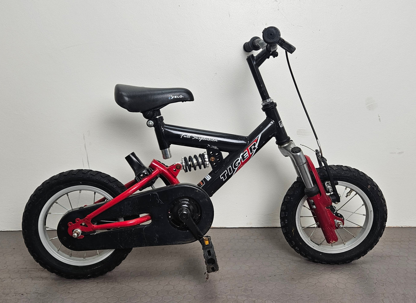 Tiger Full Suspension, 12", bättre begagnat skick